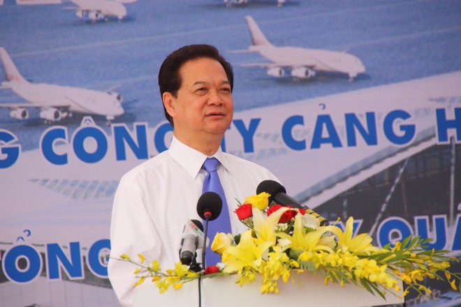 นายกรัฐมนตรี Nguyen Tan Dung เข้าร่วมพิธีเปิดโครงการขยายสนามบินนานาชาติ Cát Bi  - ảnh 1
